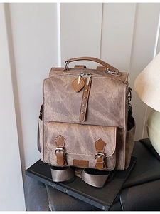 Retro deep brown PU leather backpack with magnetic buckle flap and front pockets
