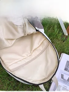 Macro view of the internal capacity of the two-tone outdoor backpack with inner pockets