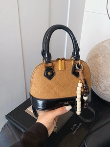 Brown suede shell bag with diamond stitching and bead charm for professional women