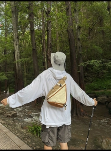 Outdoor crossbody chest bag with adjustable drawstring in khaki and off-white colorblock