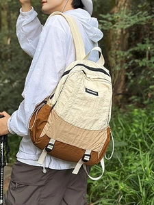 Three-color patchwork nylon outdoor backpack with adjustable straps for hiking and travel