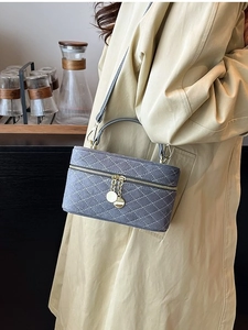 Chic dark grey quilted box handbag with top handle and adjustable shoulder strap for women