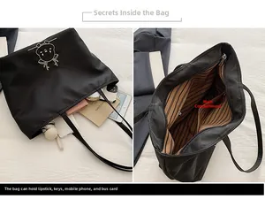 Detail of black canvas tote showing large capacity for iPad and daily items with inner lining