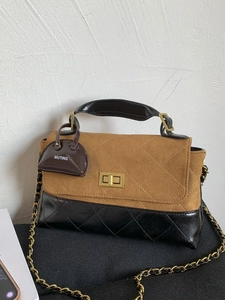 Vintage quilted chain shoulder bag in brown suede and black leather with gold clasp