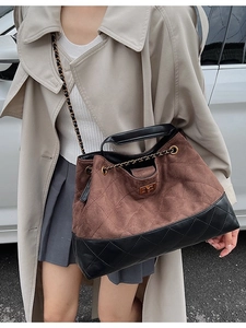 Retro large tote bag with brown suede quilting, black leather trim, and chain strap
