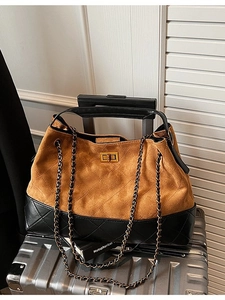 Retro oversized tote bag in brown suede and black leather with diamond quilting and chain