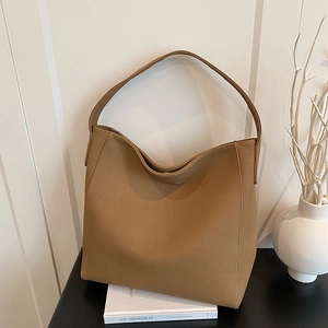 Bolso tote retro marrón caramelo con correa ancha para el hombro y gran espacio