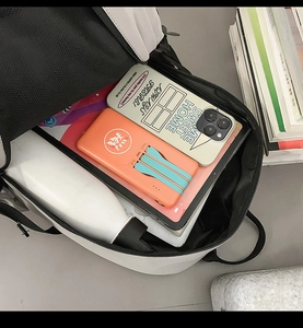 Top view of large capacity backpack interior showing laptop and daily essentials storage