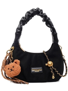 Black suede crescent shoulder bag with pleated handle and cute bear charm pendant