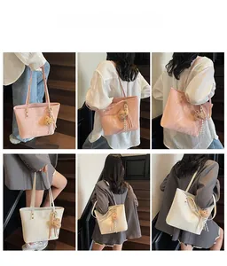 Multiple views of large capacity tote bag with plush bear charm and tassel detail