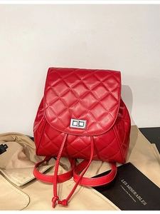 Quilted red PU leather backpack with silver turn-lock and drawstring for casual wear