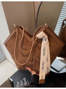 Brown frosted suede tote bag with V-cut design and stylish woven strap detail