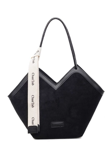 Minimalist black matte leather tote bag with V-shaped opening and canvas ribbon detail