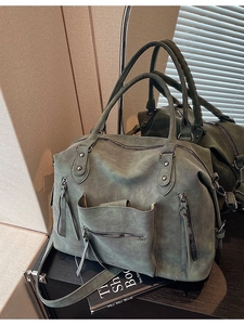 Retro grey-green matte leather tote bag with multi-zipper detail and spacious interior
