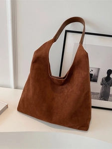 Minimalist brown suede hobo bag with leather handles for women stylish autumn daily use