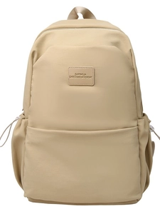 Minimalist khaki large capacity backpack with textured fabric and front pocket