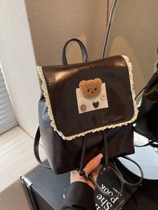 Cute brown PU leather backpack with lace trim and plush bear decoration for students