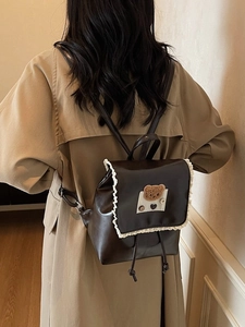 Brown faux leather backpack with lace trim and cute teddy bear patch for school style