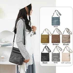 Retro crossbody phone bag with tassel and wide strap shown in seven diverse color options