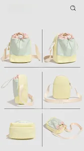 Detailansichten der bunten Umhängetasche mit Kordelzug und Kleiman-Stickerei-Details