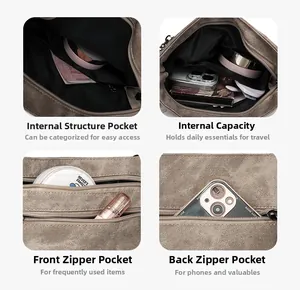 Detail view of khaki canvas crossbody bag with multi-layer pockets and organized storage space