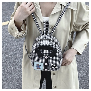 Close-up of Vichy check mini backpack with creative shirt collar design and cute bear patch