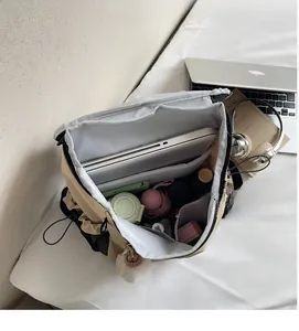 Interior view showing large capacity nylon backpack storage for laptop and tablet