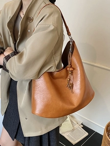 Brown vintage pleated shoulder tote bag with bohemian wooden bead tassel for women