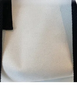 Detailed close-up of premium canvas fabric texture with durable black webbing trim