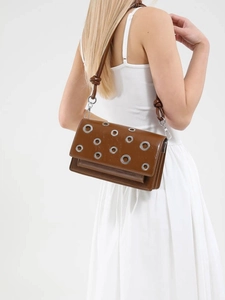 Chic brown glossy leather crossbody bag with silver eyelets and knot strap detail