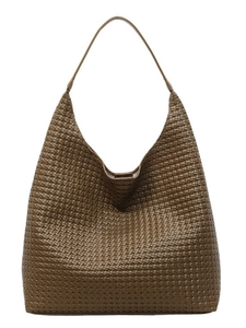 Olive green woven tote bag with oversized silhouette and herringbone leather pattern