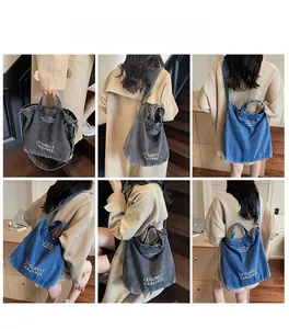 Multiple views of a large denim tote bag shown in vintage blue and dark grey worn by model