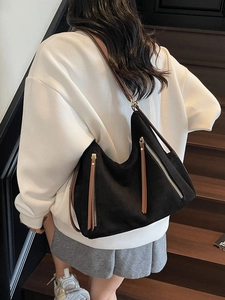 Retro black faux suede tote bag with brown straps and fringe details for women