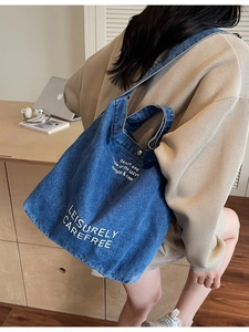 Large capacity blue denim tote bag with Leisurely print and adjustable shoulder straps
