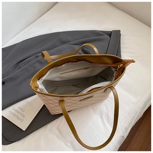 Detailed overhead view of the large tote bag showing wide interior space and zipper pocket