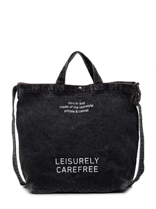 Versatile black washed denim tote bag with top handles and adjustable shoulder strap