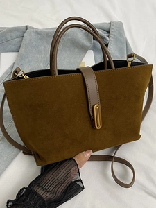 Brown frosted suede tote bag with adjustable shoulder strap and gold buckle detail