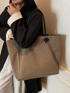 Retro khaki canvas tote bag with black leather straps and knot details for women