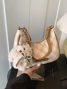 Vintage checkered hobo tote bag with mustard yellow leather strap and plush bunny charm