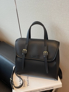 Retro black matte leather backpack with gold buckles and flap cover for daily commute