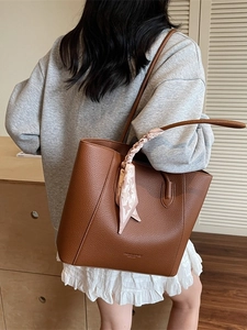 Brown litchi leather tote bag with houndstooth silk scarf for casual commute wear