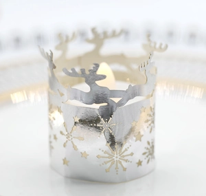 Silver metal lampshade with hollow reindeer and snowflake design for tea light candles