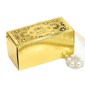 Golden Eid Mubarak laser cut hollow favor box with floral patterns for festive candy gifts