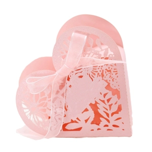 Pink heart-shaped laser-cut favor box with pearl paper and ribbon for weddings