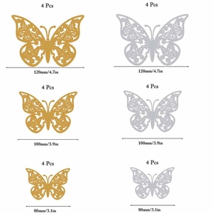 Detailed view of 3D butterfly wall stickers in gold and silver showing varied sizes