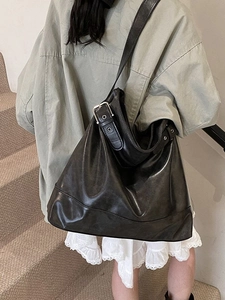 Large black faux leather hobo shoulder bag with buckle strap for casual daily commuting