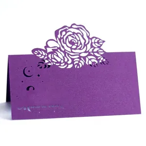 Laser cut purple table place card featuring 3D rose patterns and moon stars cutouts