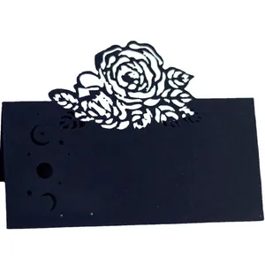 Laser-cut black paper place cards with elegant rose and moon hollow design for table settings