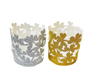 Glittery gold and silver four-leaf clover hollowed-out paper tea light candle covers