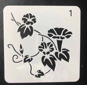 Macro detail of square PET stencil featuring hollow morning glory floral pattern